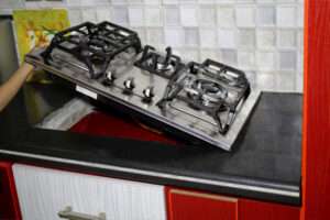 Gas stove fixing tools and equipment displayed.